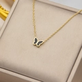 Elegant gold titanium steel necklace featuring a black shell butterfly pendant on a jewelry box - Gold Black