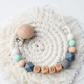 Beech wood pacifier clip with BABY letters and mint green silicone beads on tassel mat - Gray