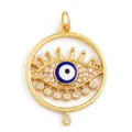 Evil Eye charm pendant in gold finish with blue stones and sparkling white zircons - Cyan