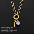 Exquisite gold stainless steel necklace featuring purple crystal and lowercase letter f pendant - Lowercase f