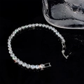 Adjustable silver tennis bracelet with sparkling cubic zirconia stones on black background - Silver Large Square Zirconia Bracelet
