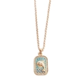Golden tarot-style necklace featuring a blue enamel dolphin pendant with seaside motifs - Dolphin Necklace