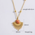 Franse vintage gouden ketting met ronde oranje edelsteen en een zonnestraal hanger detail - Zonnesteen