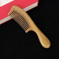 Natural sandalwood comb with round handle and fine teeth on a black velvet background - Style 6/Length 20cm/Tooth Pitch 3.0