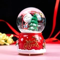 Christmas musical snow globe with Santa Claus, Christmas tree and festive red relief base - Santa Hugging Tree (21Y37) / 8cm Music + Light