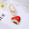 Golden keychain with red heart charm featuring a rainbow pattern and crystal accent - Red Heart Rainbow