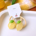 Detailed view of yellow translucent lemon charms on soft hair ties for kids - Lemon Hair Ties Pair