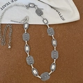 Detail of vintage silver metal waist chain with oval textured links and lobster clasp closure - Silver-Oval Textured Style