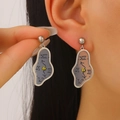 Pendientes de reloj derretido artísticos con números romanos surrealistas en acabado plata - Plateado