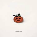 Cute Halloween pumpkin brooch with heart eyes and black bat in orange enamel finish - Pumpkin