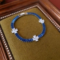 Bracciale retrò a fiori in zircone con cristalli blu su un cuscinetto di velluto - Argento-Blu