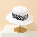 Panama style white straw sun hat with paisley ribbon on a golden display stand - M (56-58cm) / White