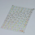 Autocollants à ongles cœurs holographiques M-628 avec fini iridescent sur support transparent - Cœur Creux - Holographique (M-008-Laser)