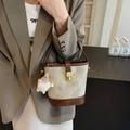 Beige canvas bucket bag with dark brown leather trim and a cute plush doll charm - White & Brown (With Charm)