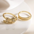 Luxury 18K gold plated bow ring set with sparkling zircons on elegant white ceramic stand - Bowknot + Beaded Set