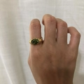 Vintage 18K gold-plated titanium ring featuring a grooved band and oval olive green gemstone - US 6 / Emerald Green Zirconia