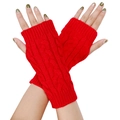 Red cable knit fingerless gloves with twisted texture, worn by a model on white background - One Size / Red