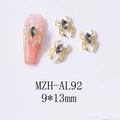 Makro-Detail einer 9x13mm goldene Spinne Nailart-Deko mit schwarzem Marquise-Stein - Goldener Sockel Schwarzer Stein (AL92)