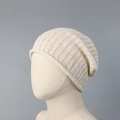 Detail of breathable beige knit beanie with colorful nep yarn and subtle hollow texture - One Size (57-62cm) / Off-white
