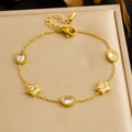 Detail of gold plated stainless steel bracelet with star charms and oval crystal stones - Five-Pointed Star Crystal Style (B1983)