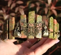 Close-up of Unakite crystal crown with bronze butterfly and bird skull details - Butterfly Raven Skull Style / Unakite/Antique Bronze Wire