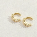 Macro detail of 14K gold plated ear cuff with baguette-cut zircon gemstones - Baguette Zirconia Row Set / Gold White Zirconia