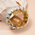 Detailed shot of wide stretch bracelet with blue marble acrylic and gold metal triangles - Blue