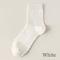 White crew socks in breathable honeycomb cotton knit with elastic ribbed cuffs - One Size / White