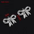 Pendentif noeud en acier inoxydable argenté 3cm x 2,2cm pour création bijoux - Style G / Acier