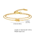Gold double-layer stainless steel knotted bracelet with detailed size measurement labels - Gold