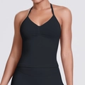 Close-up of seamless black halter yoga top featuring fine fabric texture and neat stitching - Black