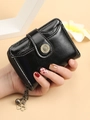 Chic black small leather clutch with metal sunflower buckle and stylish tassel chain - Black