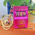 Mini Macau slot machine keychain in rose red finish with gold bell and lucky fruit symbols - Macau Pink Gold Buckle And Golden Bell / 1000 Minimum Order