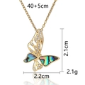 Detailed view of golden butterfly pendant with iridescent shell inlay and dimension specs - Gold Sparkling Butterfly Necklace