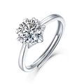 Detail of a sparkling round D-color Moissanite set in a 925 sterling silver adjustable ring - Starlight Ring / 1 Carat / Ring Only