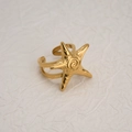Adjustable gold starfish ring with spiral texture on white textured paper background - Ring (Adjustable Open)