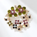 Luxury floral wreath brooch with colorful rhinestones in a gold alloy setting - Elegant Floral Wreath