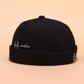 Black street style docker hat with white heartbeat embroidery and brimless design - Wave Embroidery Black