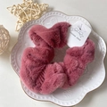 Faux rabbit fur scrunchie in dusty rose pink with soft plush texture for women - Red