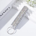 Rainbow rhinestone pill bottle keychain with three-tier storage and silver metal ring - AB White
