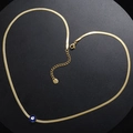Golden snake chain necklace with blue evil eye pendant arranged in a heart shape - Dark Blue