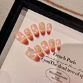 Handmade blush gradient press-on nails with white star patterns and gold charms - Extra Small (XS) / 1990-Middle Oval