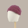Burgundy docker hat in washed cotton with retro rolled edge on a display mannequin head - Burgundy