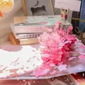3D pop-up cherry blossom greeting card with intricate pink floral layers and origami design - Blooming Peach Blossoms