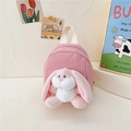 Pink canvas toddler backpack with long-eared plush bunny doll and white handle - Pink