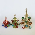 Tre eleganti alberi di Natale in vetro in rosso, verde oliva e oro con finitura glitter - Set di 3 (G/M/P)
