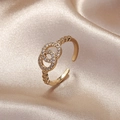 Macro detail of S925 sterling silver ring featuring double pavé zircon gold bands - Gold (J317)