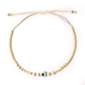 Minimalist cream beaded bracelet with blue evil eye and adjustable woven cord - Beige