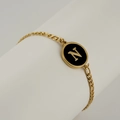Gold stainless steel chain bracelet featuring a black shell pendant with golden letter N - Letter N / Gold/Black