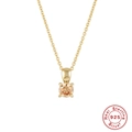 Close-up of S925 sterling silver gold necklace with champagne gemstone and authenticity seal - Gold-November